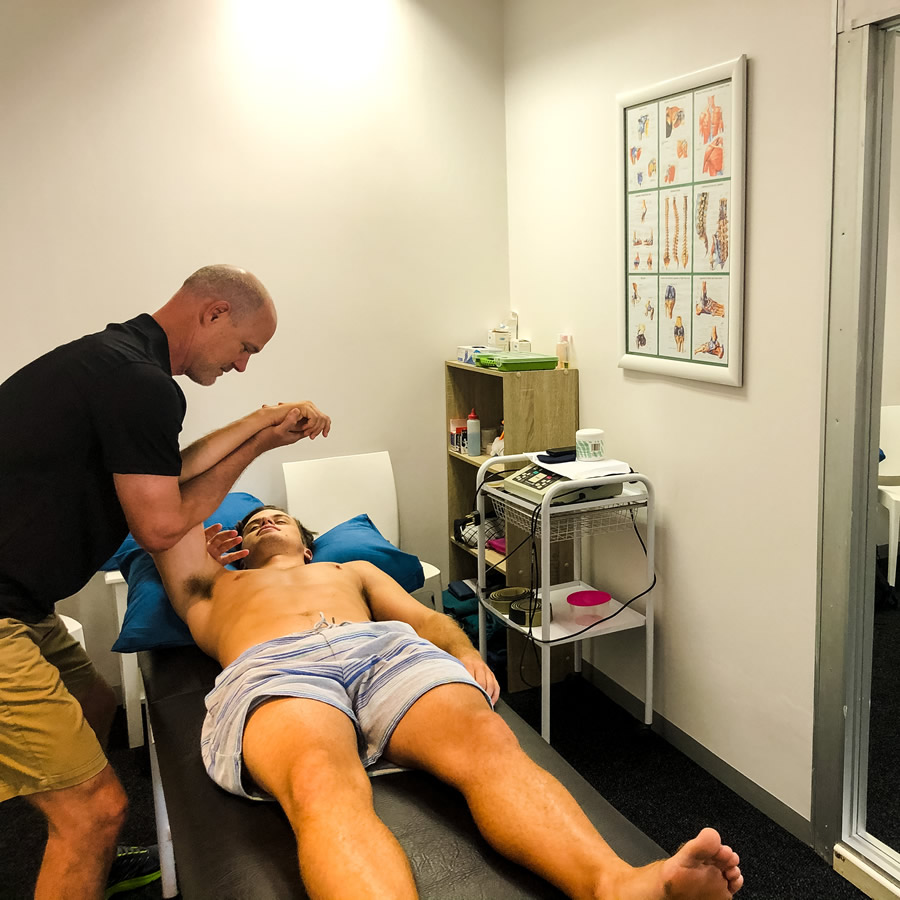 Physiotherapist performing manual therapy at Brookwood Physio Physiotherapist performing manual therapy at Brookwood Physio